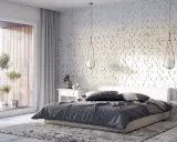 Przytulna sypialnia inspiracje: biała cegła, duże okno z widokiem na balkon, drewniana podłoga i miękki dywan tworzą relaksującą atmosferę.